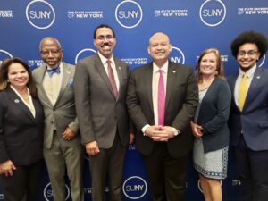 Johanna Duncan-Poitier, SUNY Senior Vice Chancellor for Community Colleges; Grant Valentine, RCC BOT Member; John King Jr., SUNY Chancellor; Lester Sandres, Rápalo, RCC President; Christy Woods, Trustee and President, Faculty Council of Community Colleges; Alexander Ruiz, SUNY Student Trustee