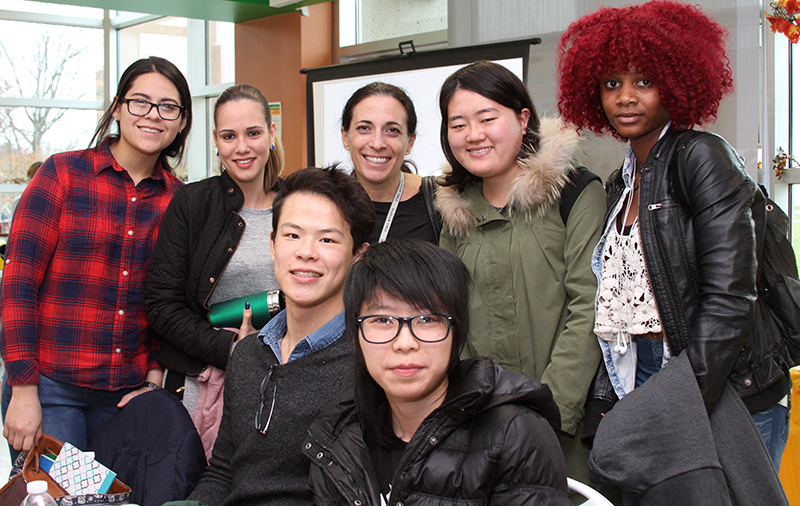 International students gather at the International Thanksgiving Luncheon with Talia Lipton, Instructor of Speech