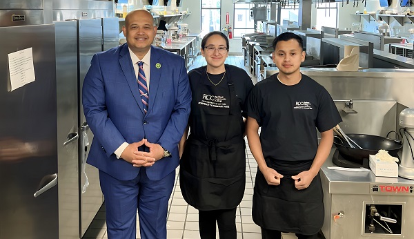 Dr. Rápalo with two students at in Hospitality and Culinary Arts Center