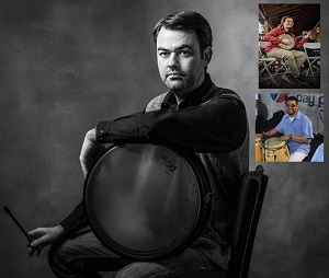 black and white photo of Colin Harte holding a drum