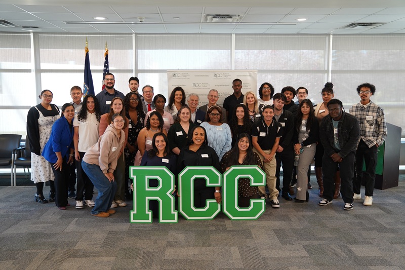 Group of Riversville Scholarship recipients with the letters RCC in front of them