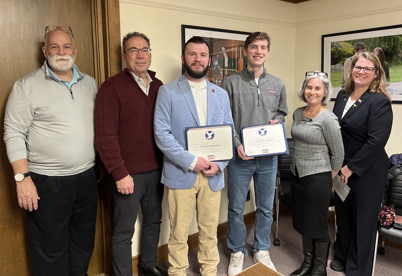 Jonathan Barnwell and Dr. Mullaney with student and faculty veterans